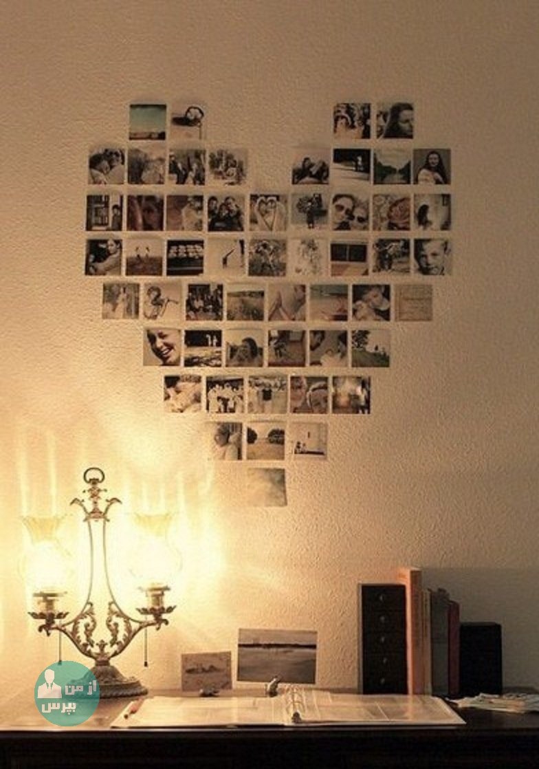 Сердце из фоторамок на стене