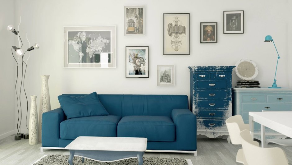 Современный синий диван в студии
