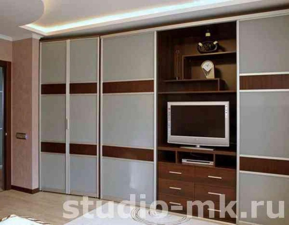 Угловая стенка в гостиную с телевизором в углу