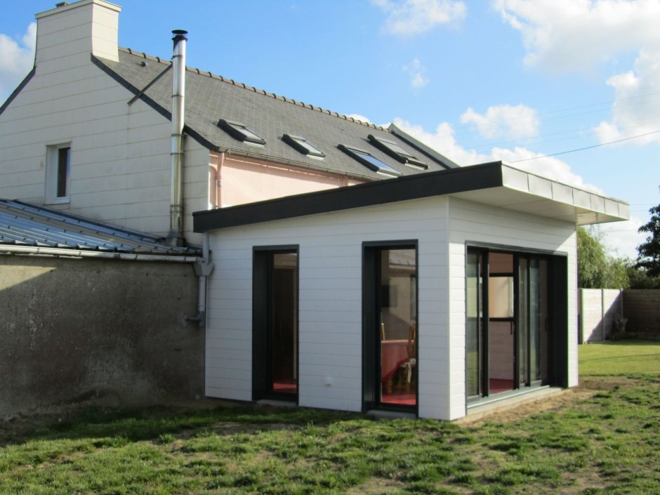 Гараж с плоской крышей пристроенный к дому