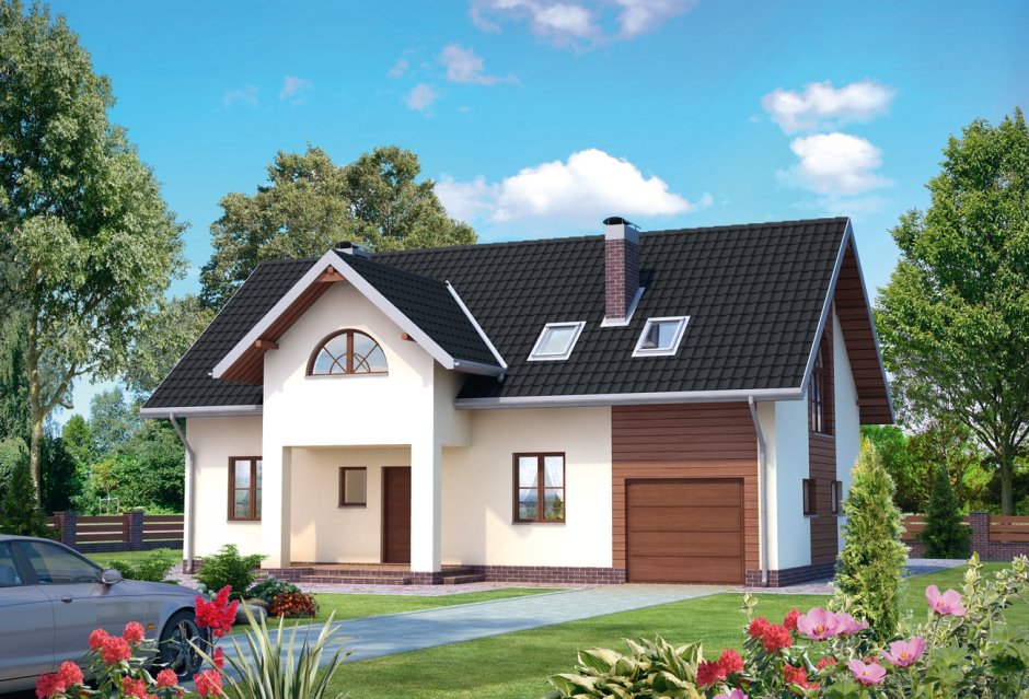 Кирпичный дом с мансардой и гаражом