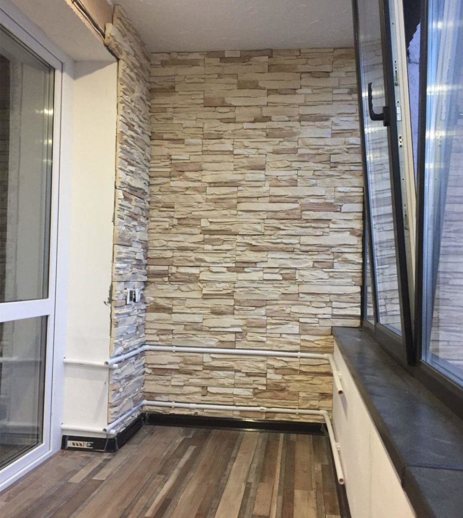 Отделка балкона под кирпич