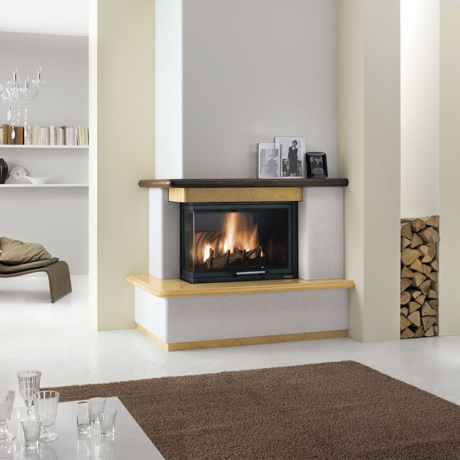 Угловой камин в интерьере квартиры