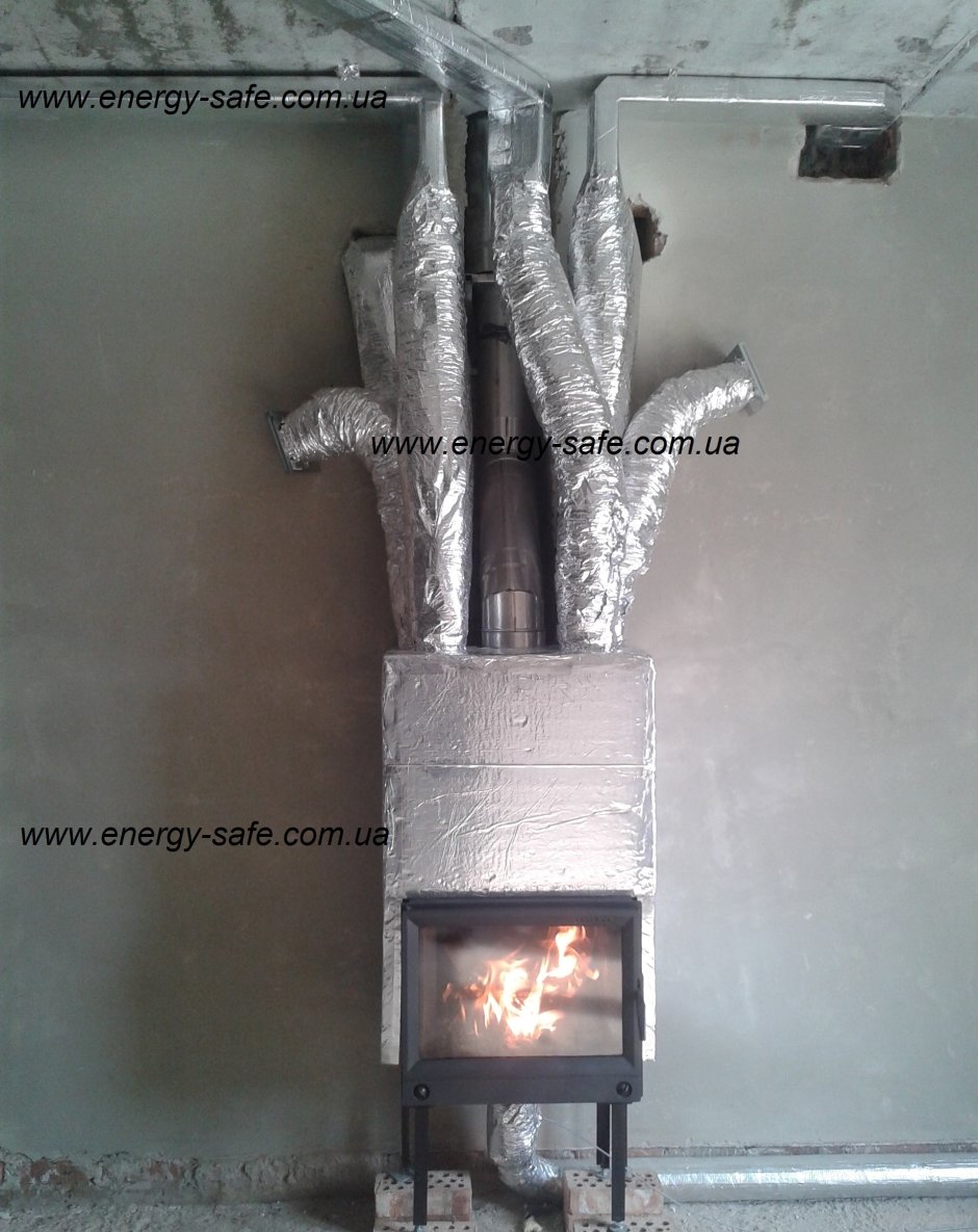 Камин с воздуховодами для обогрева