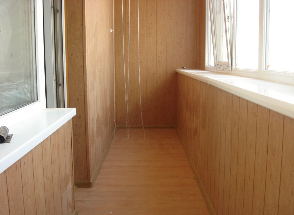 Отделка балкона МДФ панелями