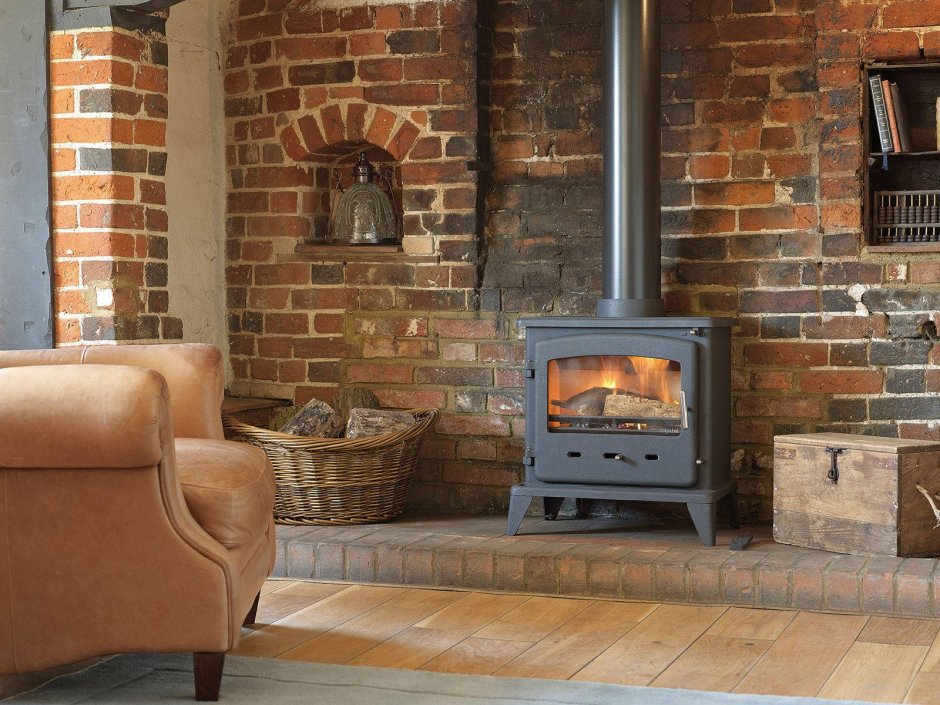 Печь камин под лестницей