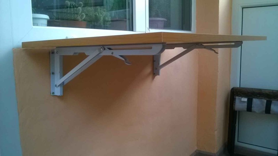 Механизм для откидного стола на балконе