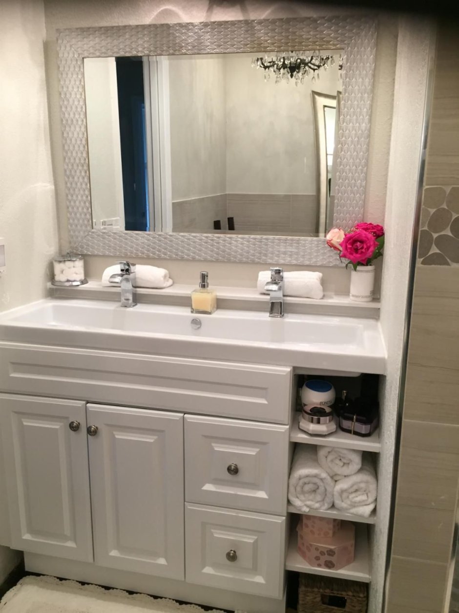 Зеркало над раковиной в ванной