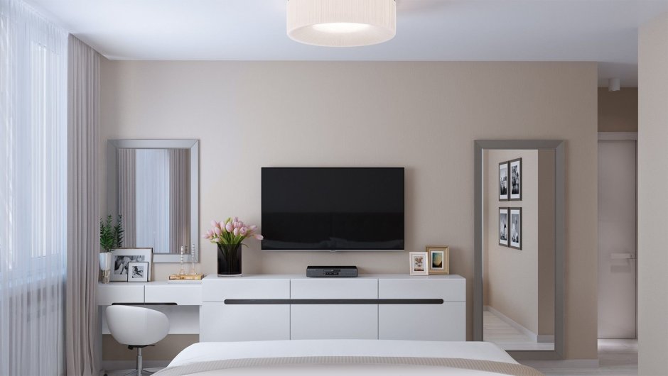 Спальня с телевизором и туалетным столиком