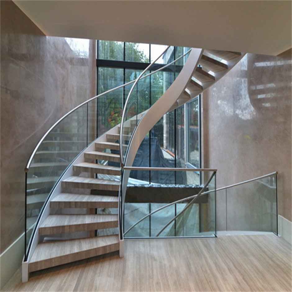Винтовая лестница со стеклянным ограждением