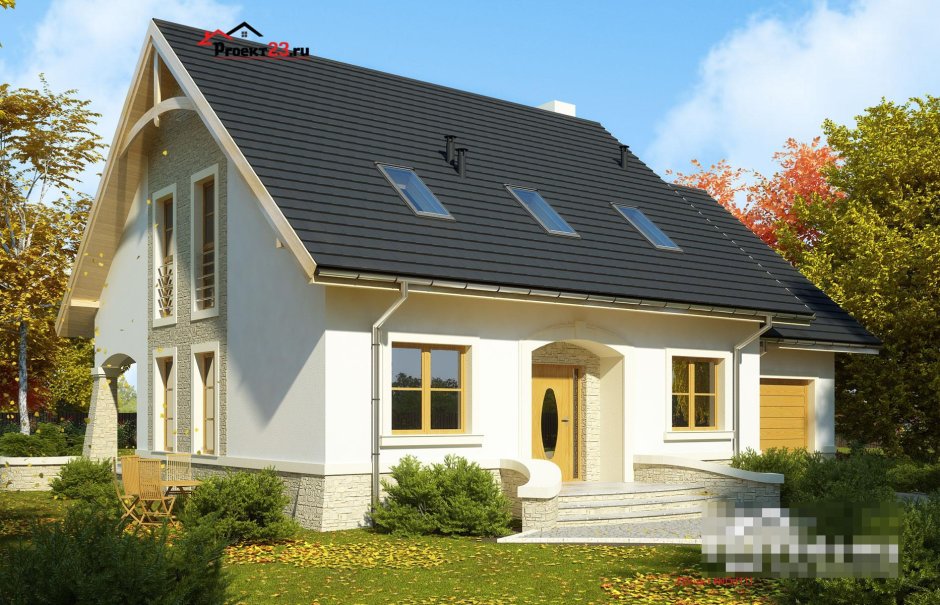 Красивый фасад дома с мансардой