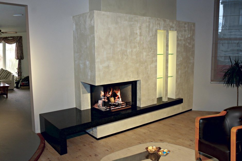 Камин с угловым стеклом в интерьере