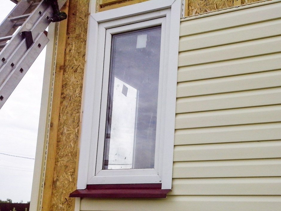 Сайдинг вокруг окна