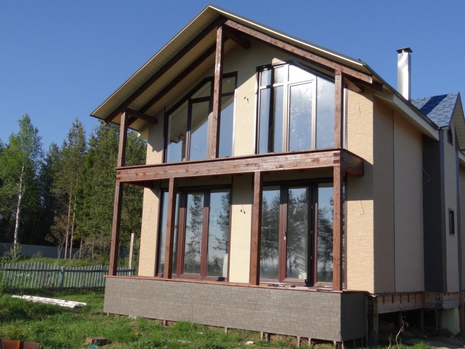 Каркасный дом с панорамными окнами двухэтажный