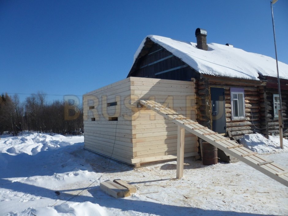 Пристройка к бревенчатому дому