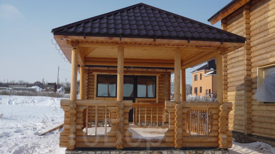 Пристройка к дому из бревна