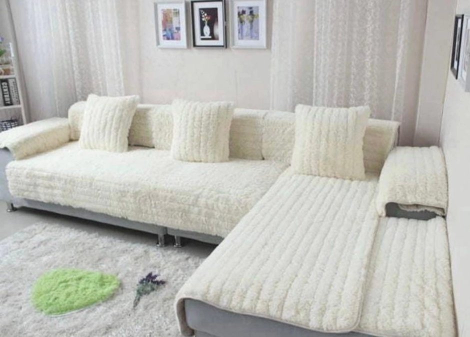 Плед в интерьере гостиной