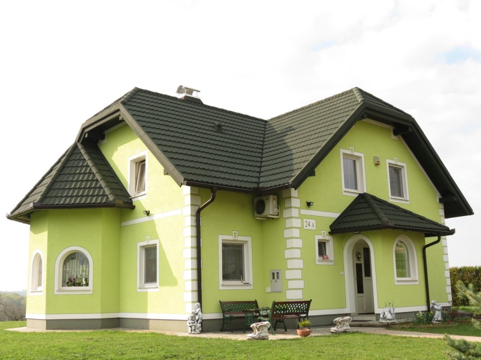 Фасады домов фисташкового цвета