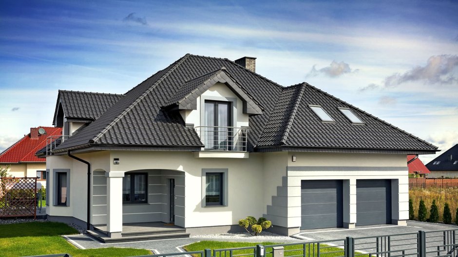 Двухэтажный дом с серой крышей