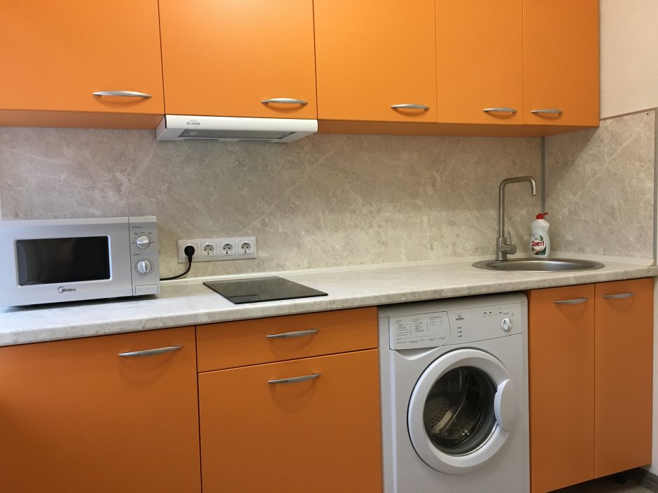 Стиральная машина на кухне