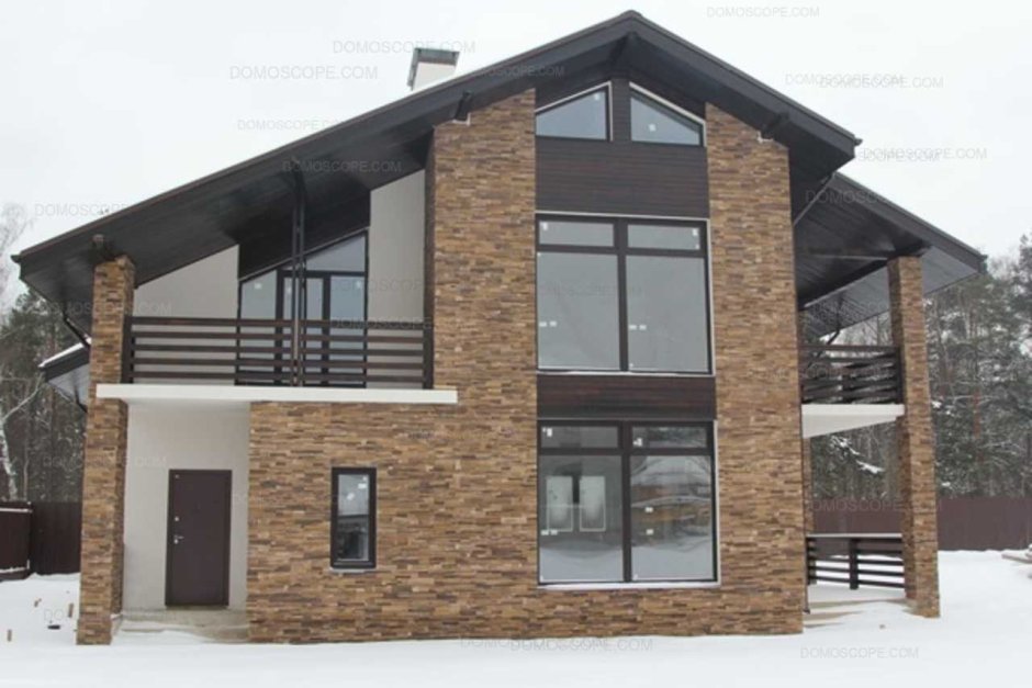 Дом из кирпича с панорамными окнами
