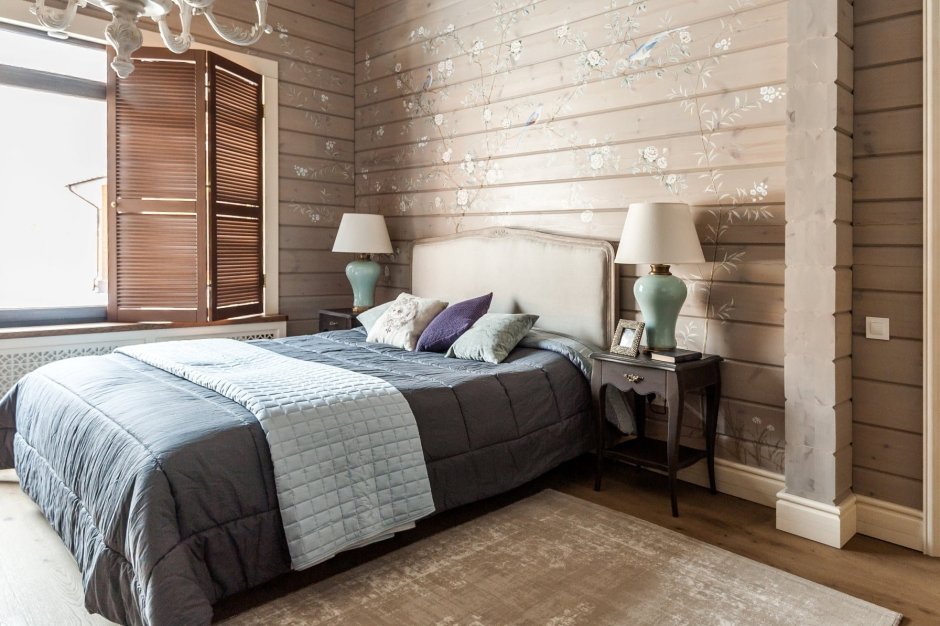Интерьер спальни в доме из клееного бруса