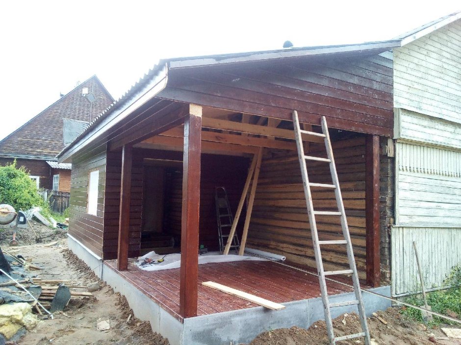 Пристройка гаража к деревянному дому
